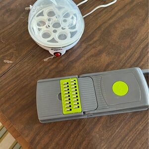 Egg, poacher, and vegetable slicer combo